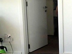 hidden cam catches big titted milf getting changed