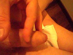 playing with semi-hard cock